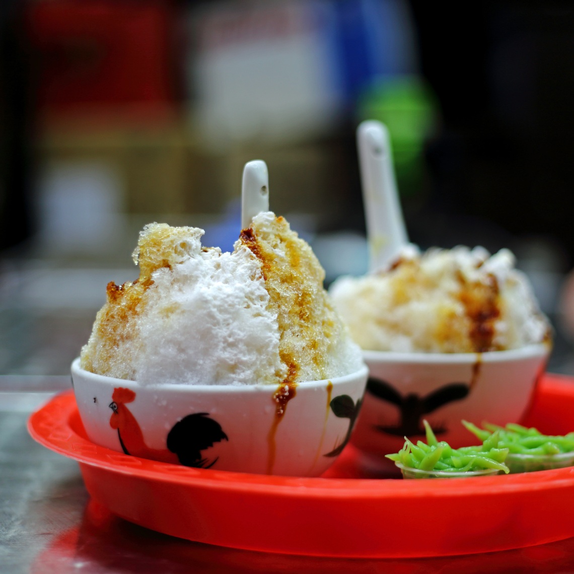 Chendol, an iced dessert made from rice flour and pandan jelly with coconut milk and palm sugar